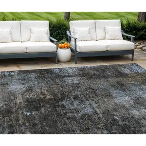 Photo of Graphite Charcoal And Silver Abstract Washable Indoor Outdoor Area Rug