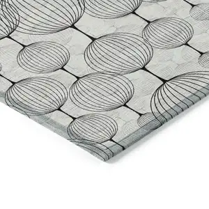 Photo of Graphite Gray And Silver Geometric Washable Indoor Outdoor Area Rug