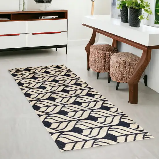 2' x 6' Graphite and Tan Abstract Leaves Washable Runner Rug Photo 1