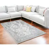 Photo of Gray Abstract Area Rug With Fringe
