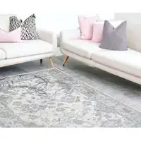 Photo of Gray Abstract Area Rug With Fringe