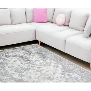 Photo of Gray Abstract Area Rug With Fringe