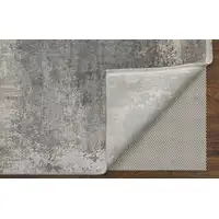 Photo of Gray Abstract Power Loom Area Rug With Fringe