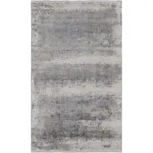 Photo of Gray Abstract Power Loom Area Rug With Fringe