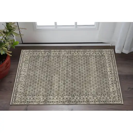 Gray And Beige Diamond Area Rug With Fringe Photo 1