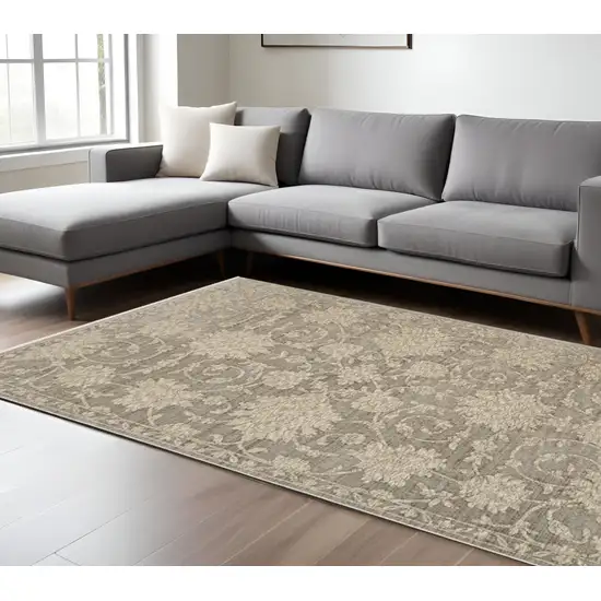 Gray And Beige Floral Area Rug With Fringe Photo 1