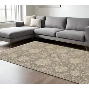 Photo of Gray And Beige Floral Area Rug With Fringe