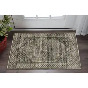 Photo of Gray And Beige Medallion Area Rug With Fringe