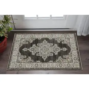 Photo of Gray And Beige Medallion Area Rug With Fringe