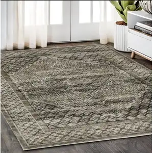 Photo of Gray And Beige Medallion Area Rug With Fringe