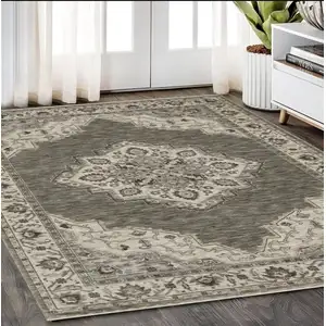 Photo of Gray And Beige Medallion Area Rug With Fringe