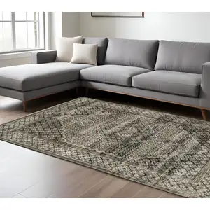 Photo of Gray And Beige Medallion Area Rug With Fringe