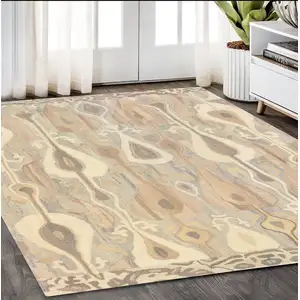 Photo of Gray And Beige Wool Abstract Hand Tufted Area Rug