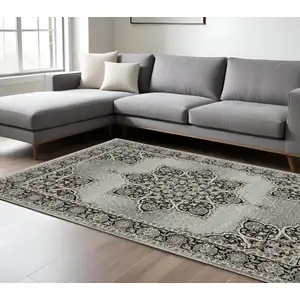 Photo of Gray And Black Medallion Area Rug With Fringe