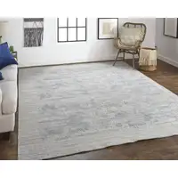 Photo of Gray And Blue Abstract Hand Woven Distressed Area Rug