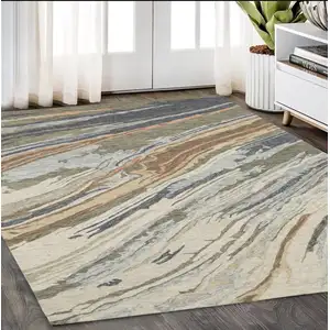 Photo of Gray And Blue Wool Abstract Hand Tufted Area Rug