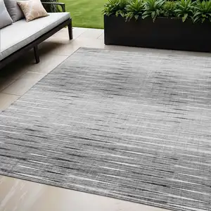 Photo of Gray And Charcoal Abstract Washable Indoor Outdoor Area Rug