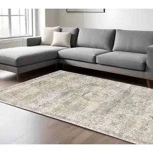 Photo of Gray And Gold Medallion Hand Tufted Area Rug