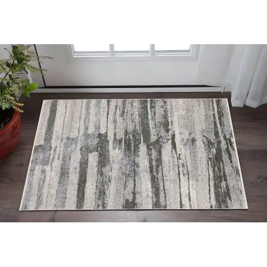 Gray And Ivory Abstract Area Rug With Fringe Photo 1