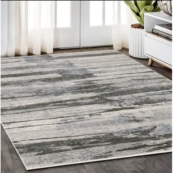 Gray And Ivory Abstract Area Rug With Fringe Photo 1