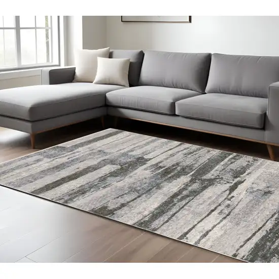 Gray And Ivory Abstract Area Rug With Fringe Photo 1