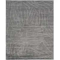 Photo of Gray And Ivory Abstract Hand Woven Area Rug