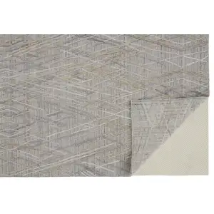 Photo of Gray And Ivory Abstract Hand Woven Area Rug