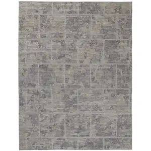 Photo of Gray And Ivory Abstract Hand Woven Area Rug