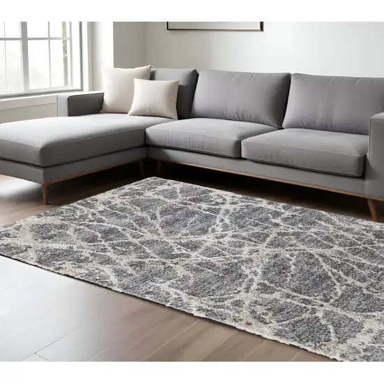 Gray and Ivory Abstract Power Loom Area Rug Photo 1