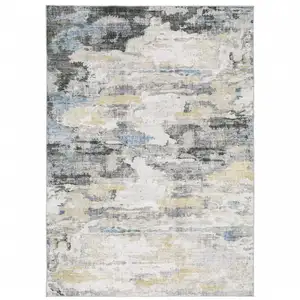 Photo of Gray And Ivory Abstract Printed Stain Resistant Non Skid Area Rug