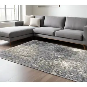 Photo of Gray And Ivory Abstract Shag Area Rug