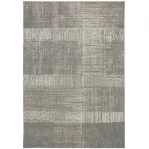 Photo of Gray And Ivory Abstract Stain Resistant Area Rug