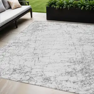 Photo of Gray And Ivory Abstract Washable Indoor Outdoor Area Rug