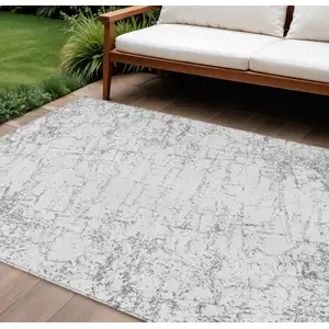 Photo of Gray And Ivory Abstract Washable Indoor Outdoor Area Rug