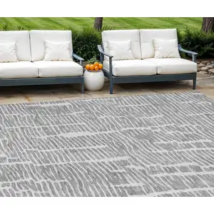 Photo of Gray And Ivory Abstract Washable Indoor Outdoor Area Rug