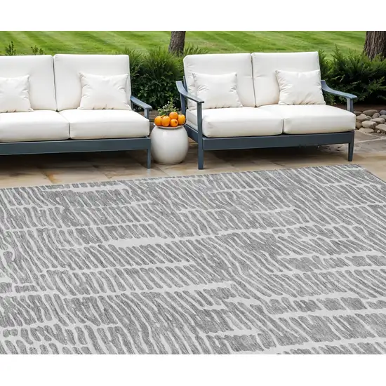 Gray And Ivory Abstract Washable Indoor Outdoor Area Rug Photo 1