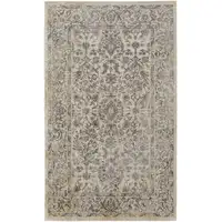 Photo of Gray And Ivory Floral Power Loom Distressed Area Rug