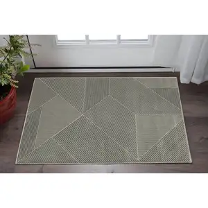 Photo of Gray And Ivory Geometric Area Rug