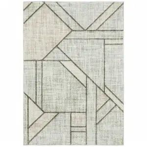 Photo of Gray And Ivory Geometric Power Loom Area Rug