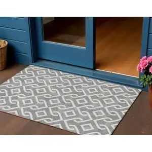 Photo of Gray And Ivory Geometric Washable Indoor Outdoor Area Rug