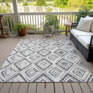 Photo of Gray And Ivory Geometric Washable Indoor Outdoor Area Rug