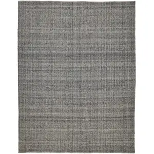 Photo of Gray And Ivory Hand Woven Area Rug