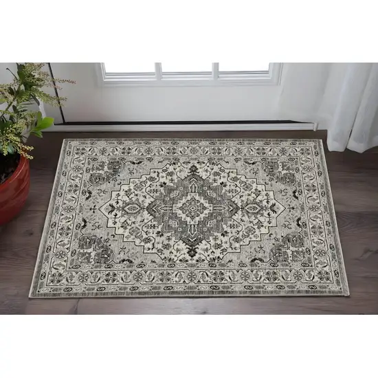 Gray And Ivory Medallion Area Rug With Fringe Photo 1