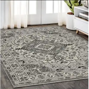 Photo of Gray And Ivory Medallion Area Rug With Fringe