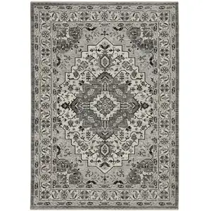 Photo of Gray And Ivory Medallion Area Rug With Fringe