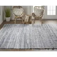 Photo of Gray And Ivory Striped Hand Woven Stain Resistant Area Rug