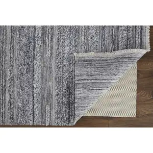 Photo of Gray And Ivory Striped Hand Woven Stain Resistant Area Rug