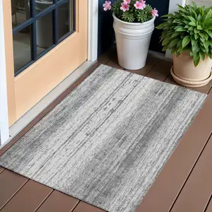 Photo of Gray And Ivory Striped Washable Indoor Outdoor Area Rug