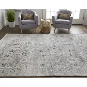 Photo of Gray And Silver Abstract Power Loom Distressed Area Rug