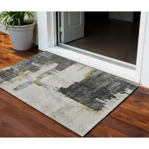 Photo of Gray And Tan Abstract Washable Indoor Outdoor Area Rug